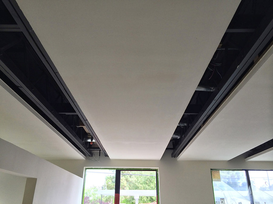 Radiant cooling clouds in the New Office of Clarum Homes look absolutely stunning!