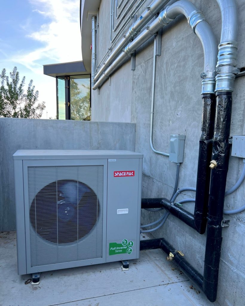 SpacePak air-to-water heat pump for hydronic heating and cooling.