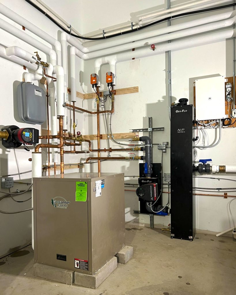 Geothermal heat pump for hydronic heating and cooling.