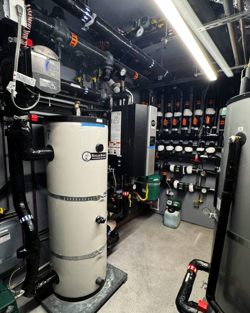 Mechanical room for hydronic heating and cooling.